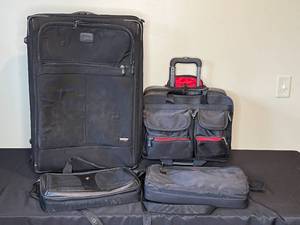 lot 271 image: Lot of Travel Bags - Kirkland Luggage, SwissGear Laptop Bag, and MOBILIT Cases