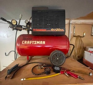 lot 1 image: Sears Craftsman 4HP 20 Gallon Air Compressor with Accessories