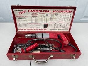 lot 4 image: Milwaukee Heavy-Duty 12 Hammer Drill with Accessories and Case