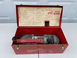 lot 21 image: Milwaukee Heavy-Duty Portable Band Saw with Case