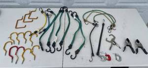 lot 132 image: Lot of Bungee Cords, Hooks, Clamps, and Hardware