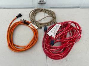 lot 276 image: Lot of 3 Heavy-Duty Extension Cords (Orange, Beige, Red)