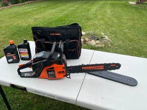 lot 291 image: Remington 51cc 18-Inch Gas Chainsaw with PowerCare Bag and Oil