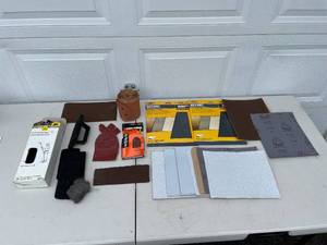 lot 150 image: Lot of Sandpaper Sheets and Sanding Supplies