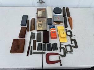 lot 170 image: Assorted Sharpening Stones, Honing Oil, and Clamps