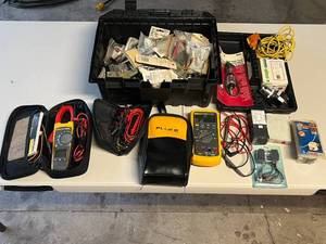 lot 68 image: Lot of Electrical Tools and Supplies Including Fluke Meters and Various Components