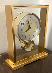 lot 33 image: Elegant Vintage Howard Miller Clock