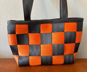 lot 230 image: The Original Seatbelt Handbag