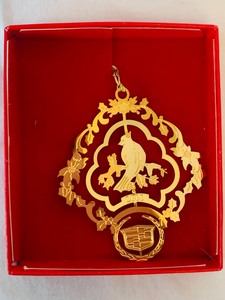 lot 104 image: Vintage Collection of 24 Gold Finish Ornaments From Cadillac Car Division