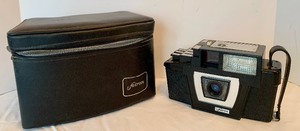 lot 106 image: Vintage Fotron Snap Load Magazine Camera with Case
