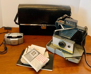 lot 101 image: Vintage Polaroid Camera with Film and Konica Z-Up 140