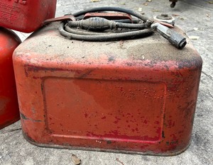 lot 411 image: Six Gas Cans