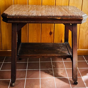 lot 67 image: Vintage Carved Accent Table with Turtle Marble Top and Rollers