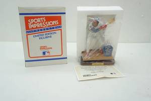 lot 34 image: Sports Impressions Figurine
