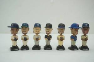 lot 59 image: mini bobbleheads