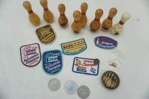 lot 100 image: Bowling patches, mini wooden pins
