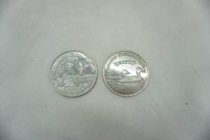 lot 102 image: Ducks Unlimited coins, 60th anniversary
