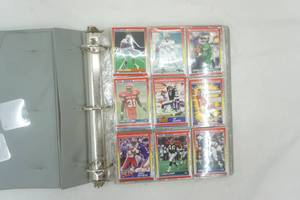 lot 140 image: NFL collector cards and Warren Spahn puzzle