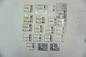 lot 158 image: Bobblehead certificates for Minnesota Twins players and Wally the Beerman