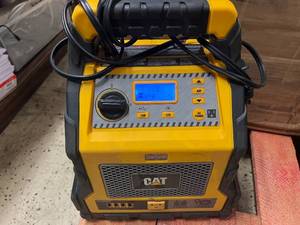 lot 9 image: CAT - 3 in 1 Professional Power Station with Jump Starter and Compressor - 4 USB Ports and Outlet