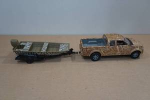 lot 71 image: Bass Pro Shops Toy Truck with Trailer and Boat