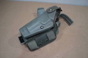 lot 99 image: Safariland Left Handed Drop Leg Holster