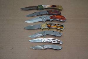 lot 121 image: 7 Folding Pocket Knives