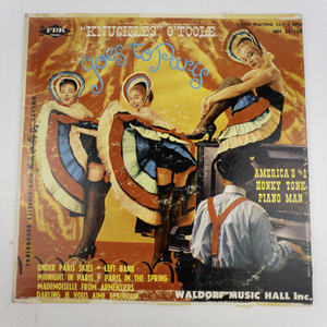 lot 208 image: KNUCKLES OTOOLE Knuckles OToole Goes To Paris LP MH 33158