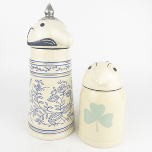 lot 17 image: Schultz & Dooley Beer Stein Circa 1960-64 Matched Pair (Schmetzer Stamped base)