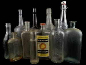 lot 75 image: Group of 11 Glass bottles (Mostly Liquor)