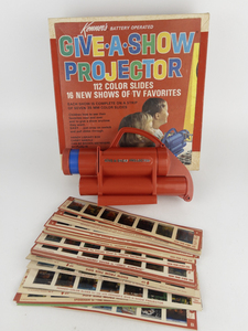 lot 104 image: Kenners  1960s Give A Show Projector with 16 Different Shows -Marvel, Three Stooges, & More-