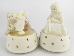 lot 115 image: Group of 2 Department 56 Snow Babies Igloo Penguin Spinning Music Boxes -Working