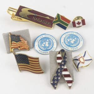 lot 299 image: Group of Pins - Flags, United Nations, USA etc
