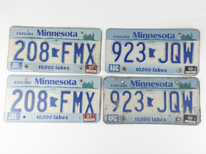 lot 363 image: Two VINTAGE MN License Plate sets  - late 1990s