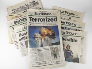 lot 356 image: Group of EIGHT VINTAGE Historical Newspapers 911 Terror Attack, Saddam Capture, Reagan Funeral, Millennium