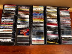 Variety of Compact Discs CDs as Seen in Photo