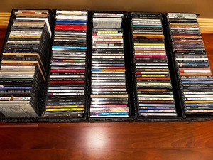 Variety of Compact Discs CDs as Seen in Photo