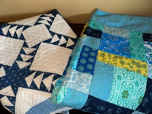 Two Handmade Quilts - Blue and White Measuring 80 x 68 and the Multi-Colored with Plush Back Measures 70 x 52