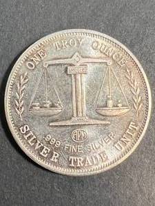 1 TROY OZ .999 FINE SILVER TRADE UNIT ROUND