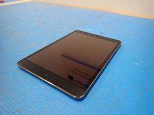 lot 45 image: Apple&nbspiPad mini 2nd Gen A1489  16GB of storage  WIFI Only  Includes Charging Cable  blemishes on the back of the case