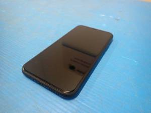 lot 54 image: Apple iPhone XR  64GB of storage  Cellular Carrier Unlocked  Includes Charing Cable  light scratches on screen 