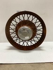 lot 11 image: Antique Chevy Wire Wheel