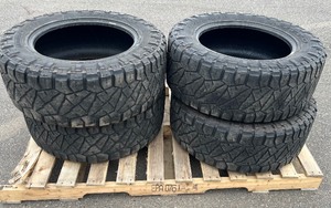lot 9 image: (4) NITTO RIDGE GRAPPLER TIRES