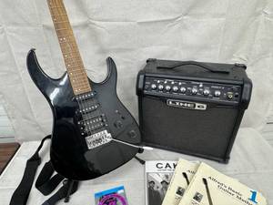 lot 15 image: Black Electric Guitar w Amp and Accessories
