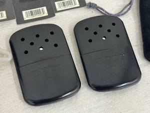lot 7 image: Zippo Hand Warmers w Accessories