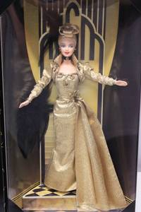 lot 36 image: Limited Edition Golden Hollywood Barbie by Mattel