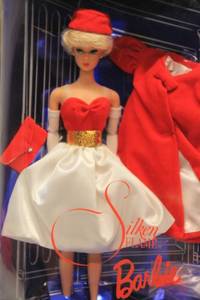 lot 82 image: Collector Edition Silken Flame Barbie Doll - 1962 Fashion and Doll Reproductions