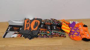 lot 144 image: Lot of 9 Halloween Clothing-Socks, Leggings, & Shirts