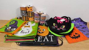 lot 145 image: Mixed Lot of Halloween Trick or Treat Bags and Ribbon Rolls-42 Items Total