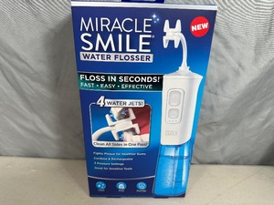 New Miracle Smile Water Flosser